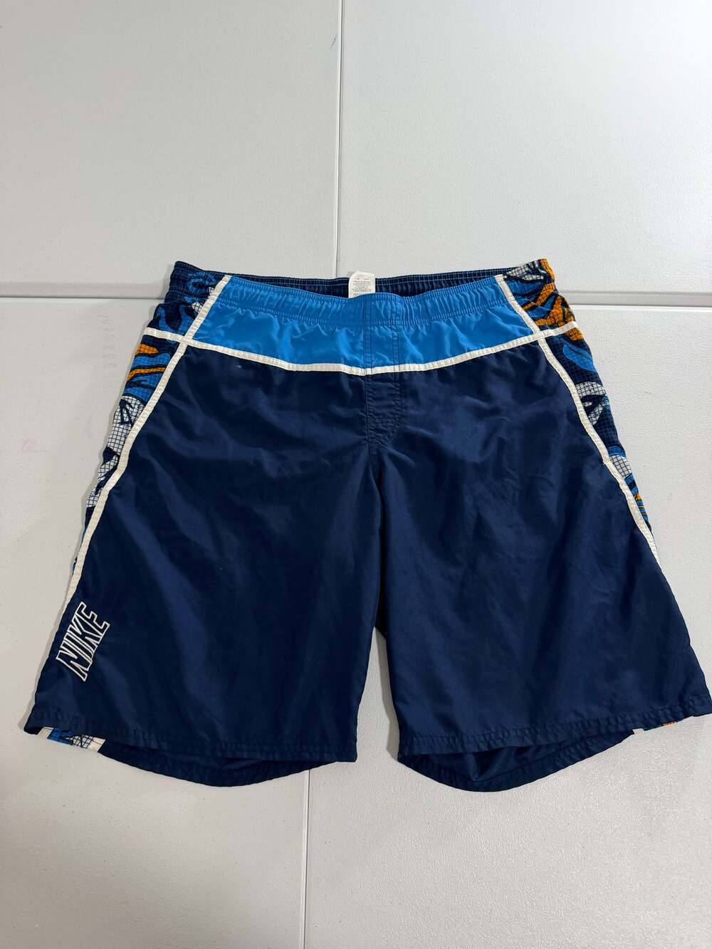 Nike Mens Swim Trunks Board Shorts L Navy Blue Orange Hibiscus Floral Mesh Lined